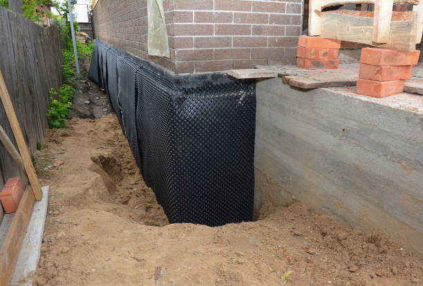 SJ Waterproofing Pros technician performing targeted Exterior Waterproofing assessment in Washington, VA
